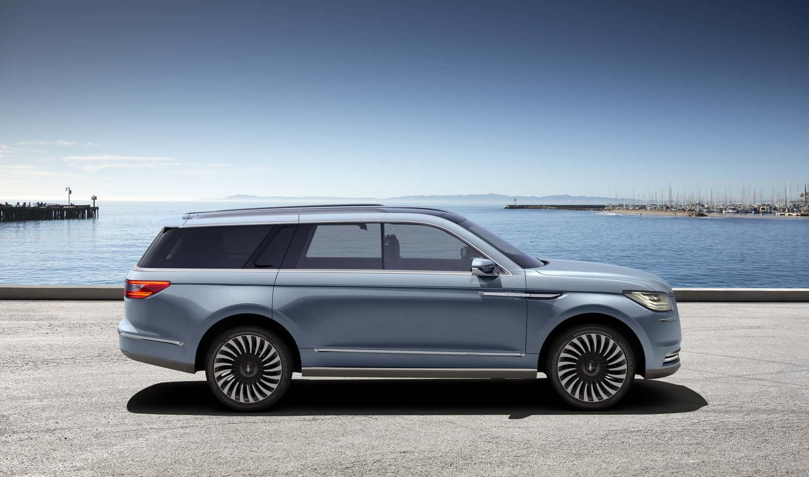 With a sleek silhouette and elegant gullwing doors, the New Navigator Concept brings quiet luxury to full-size SUVs.